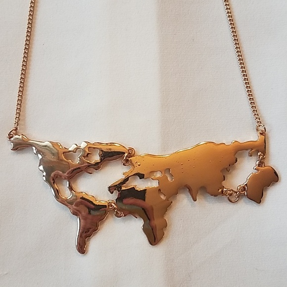 Modcloth Jewelry - MODCLOTH world map gold necklace